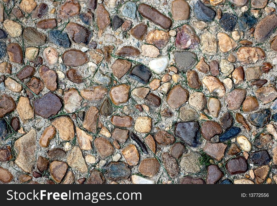 Colorful pebbles under water sparkling with life. Colorful pebbles under water sparkling with life