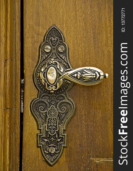 Antique brass door handle in the Mexican Chapultepec castle