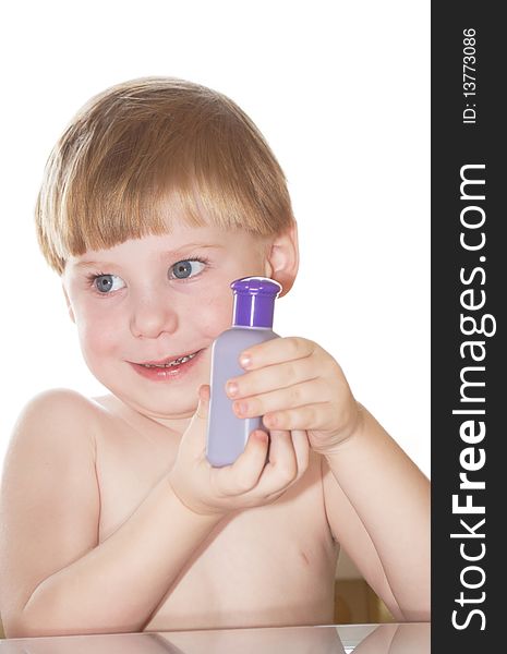 The little boy with a jar in hands on a white background. The little boy with a jar in hands on a white background