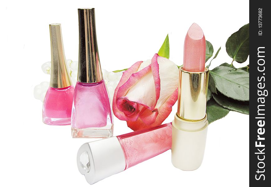 Lipstick rose nail polishers and lip gloss make up composition. Lipstick rose nail polishers and lip gloss make up composition