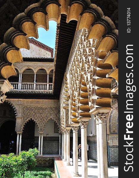 The Alcázar of Seville is a royal palace in Seville, Spain, originally a Moorish fort. The Alcázar of Seville is a royal palace in Seville, Spain, originally a Moorish fort.