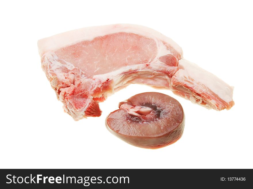 Raw pork chop and pigs kidney isolated on white. Raw pork chop and pigs kidney isolated on white