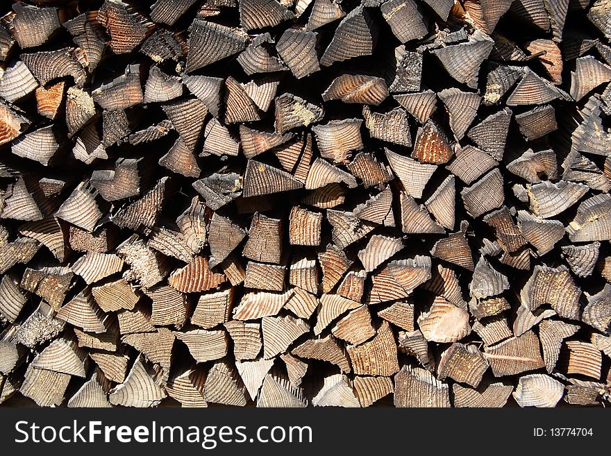 Close up view of stacked old firewood. Close up view of stacked old firewood