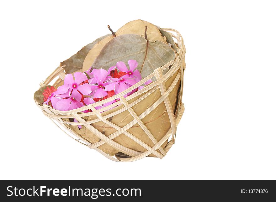 Isolated handmade flower basket made of bamboo and leaves. Isolated handmade flower basket made of bamboo and leaves