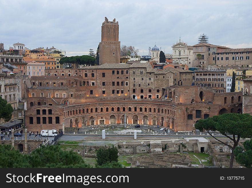 The Trajan's market ruins at dusk in Rome, Italy. The Trajan's market ruins at dusk in Rome, Italy