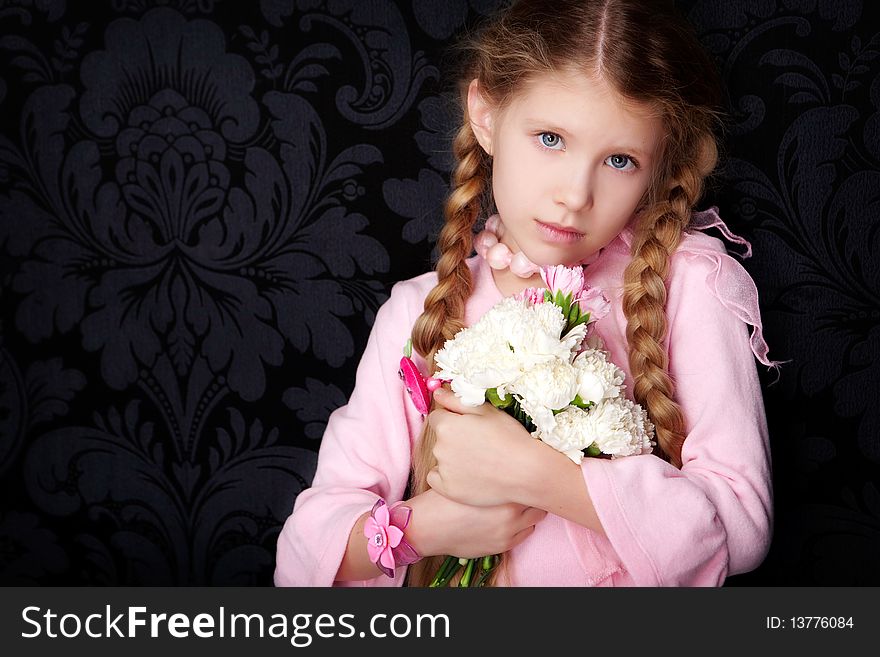 Beautiful little girl in princess dress with long hair