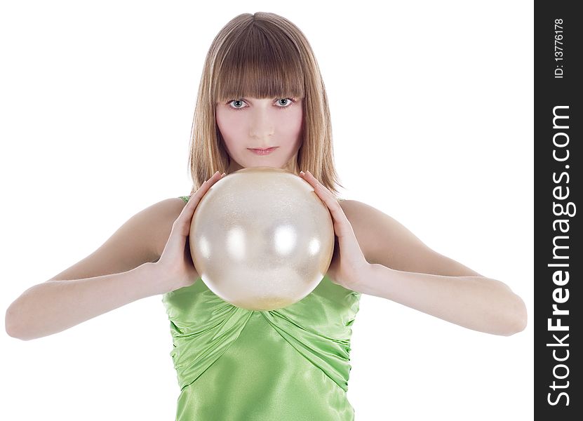 Beautiful woman with gold sphere in hand