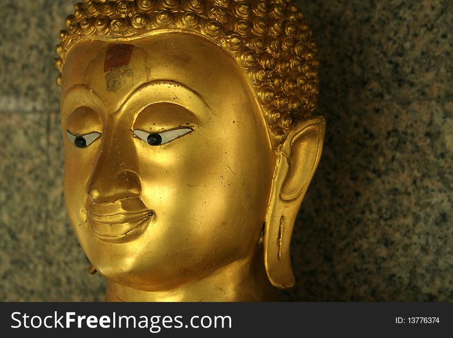 Buddha's  face at Wat Prayurawongsawas, Bangkok, Thailand