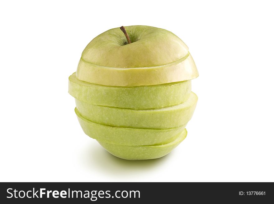 Sliced green apple on a white background