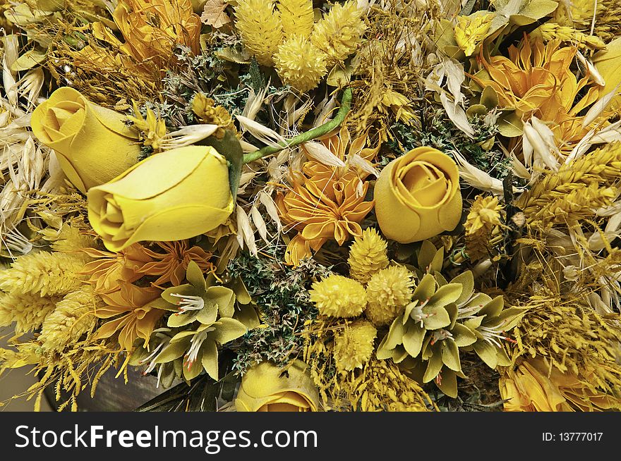 A flower arrangement to decorate a table. A flower arrangement to decorate a table