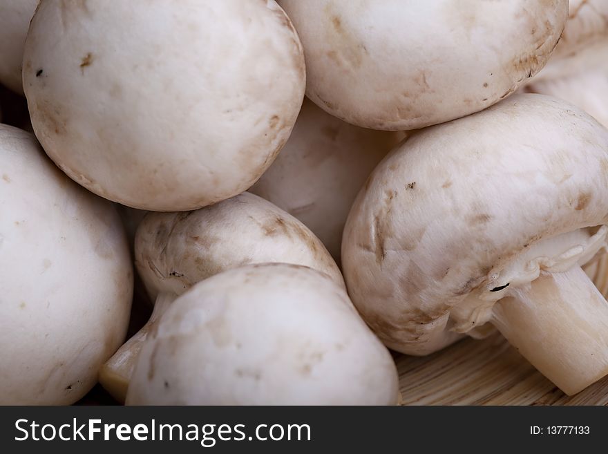 Edible white button or champignon mushrooms, healthy organic food