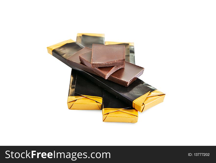 Broken chocolate bar isolated on white with clipping path. Broken chocolate bar isolated on white with clipping path