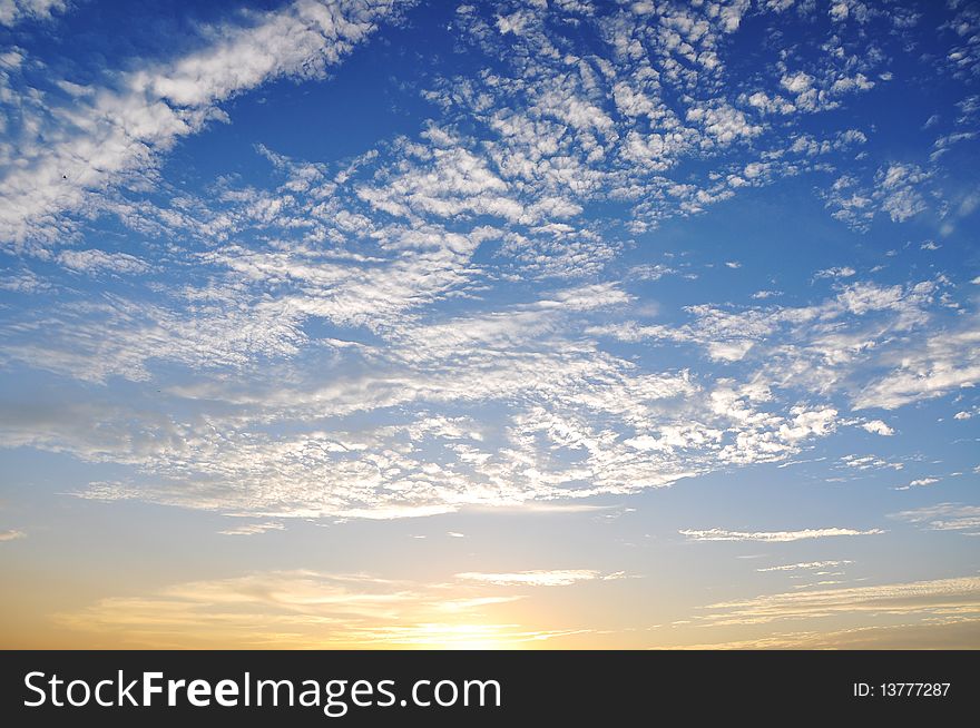Fantastic sky with white clouds and sunlight. Fantastic sky with white clouds and sunlight.