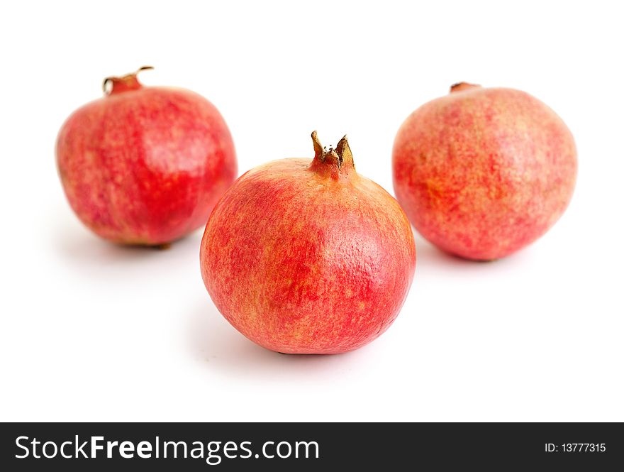 Pomegranates isolated on white background