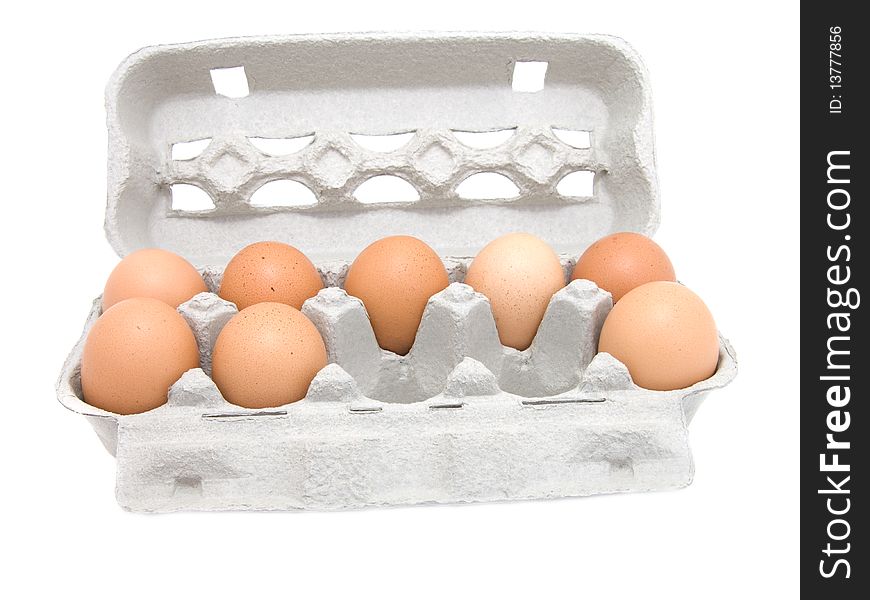 Eggs in a carton on white background