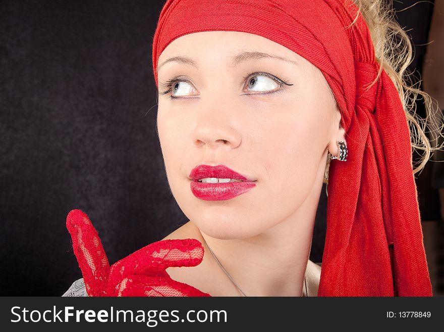 Portrait of a young girl in red color. Portrait of a young girl in red color