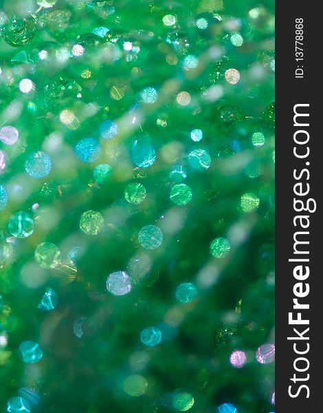 Beautiful abstract background from green beads with  a bokeh