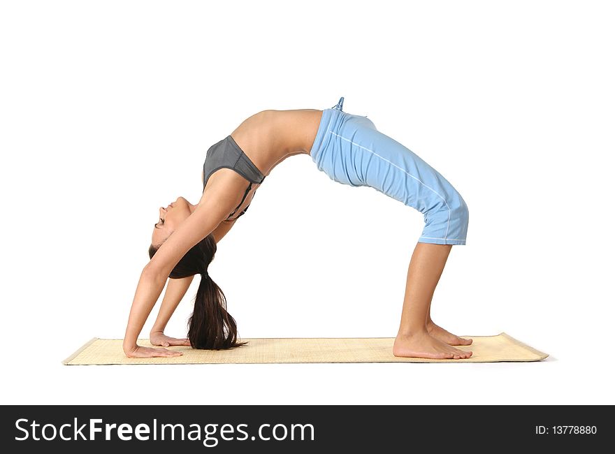 Young and attractive woman doing stretching exercise. Image isolated on a white background. Young and attractive woman doing stretching exercise. Image isolated on a white background.