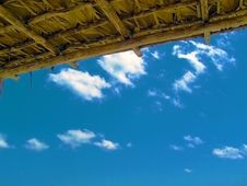 Blue Sky Under Hut Roof Stock Photo Blue Sky Under Hut Roof Stock Photo