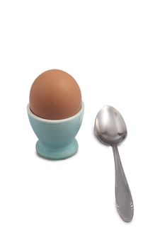 Egg With Spoon On Support Stock Photos