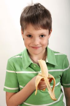 Boy With Banana Stock Photos