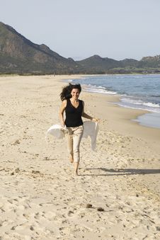 Woman Running On The Beach Stock Photos Woman Running On The Beach Stock Photos