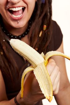 Girl And Banana Smiling Stock Photo