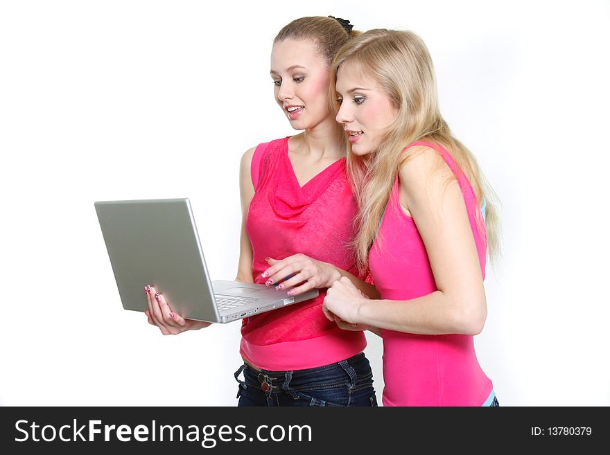 Two Young Attractive Girls With Laptop