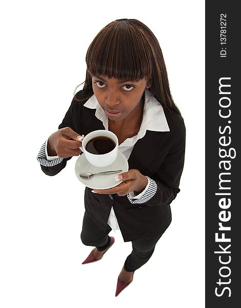 Young black female entrepreneur in suit having a cup of coffee. Young black female entrepreneur in suit having a cup of coffee