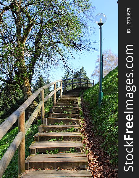 Wooden stairway set up on the hillside