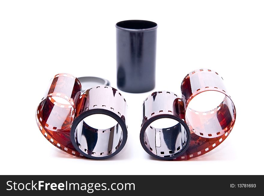 Camera film and black box isolated on white. Camera film and black box isolated on white