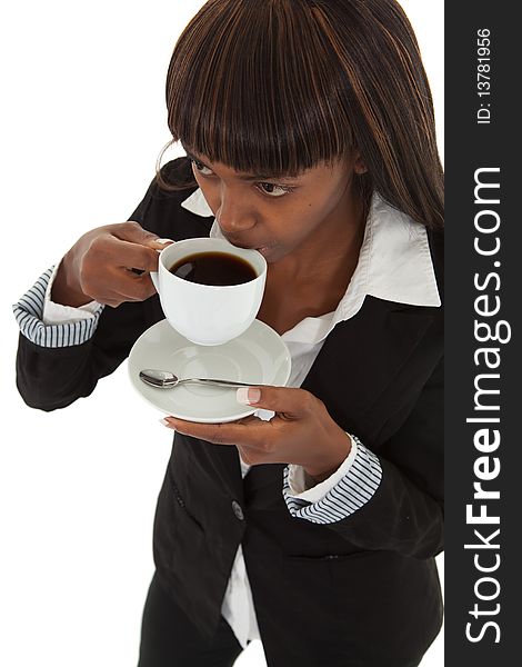 Young black female executive taking a break drinking coffee. Young black female executive taking a break drinking coffee