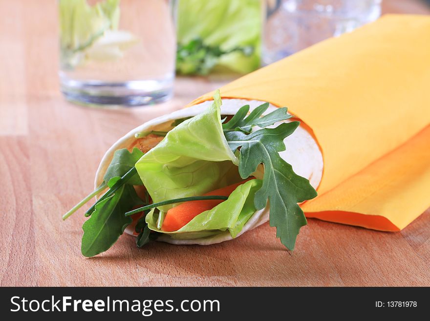 Vegetable salad wrap sandwich with chicken fajitas