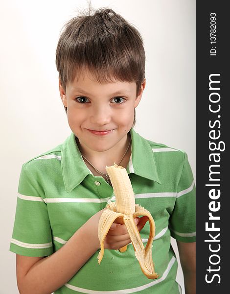 Boy with banana in hands