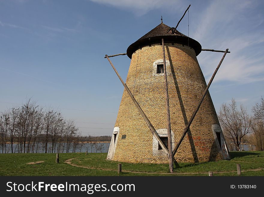 Old windmill on the lake