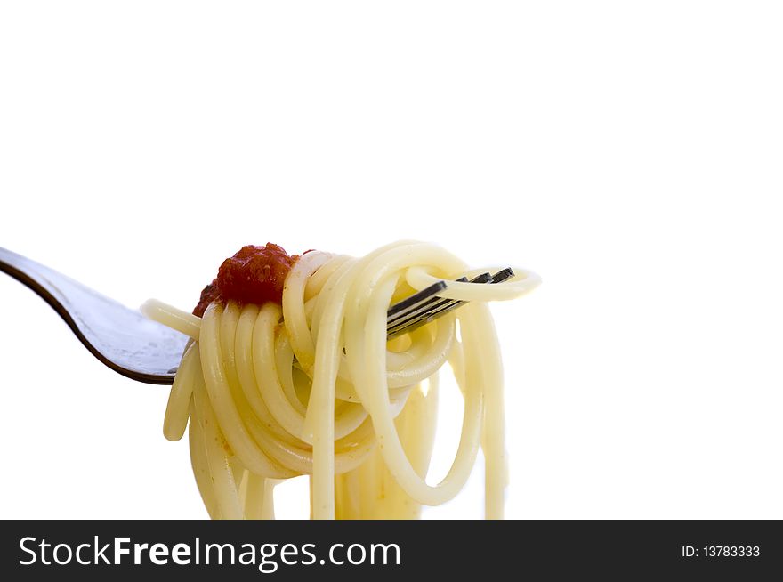Freshly made spaghetti rolled on fork, isolated on white. Freshly made spaghetti rolled on fork, isolated on white