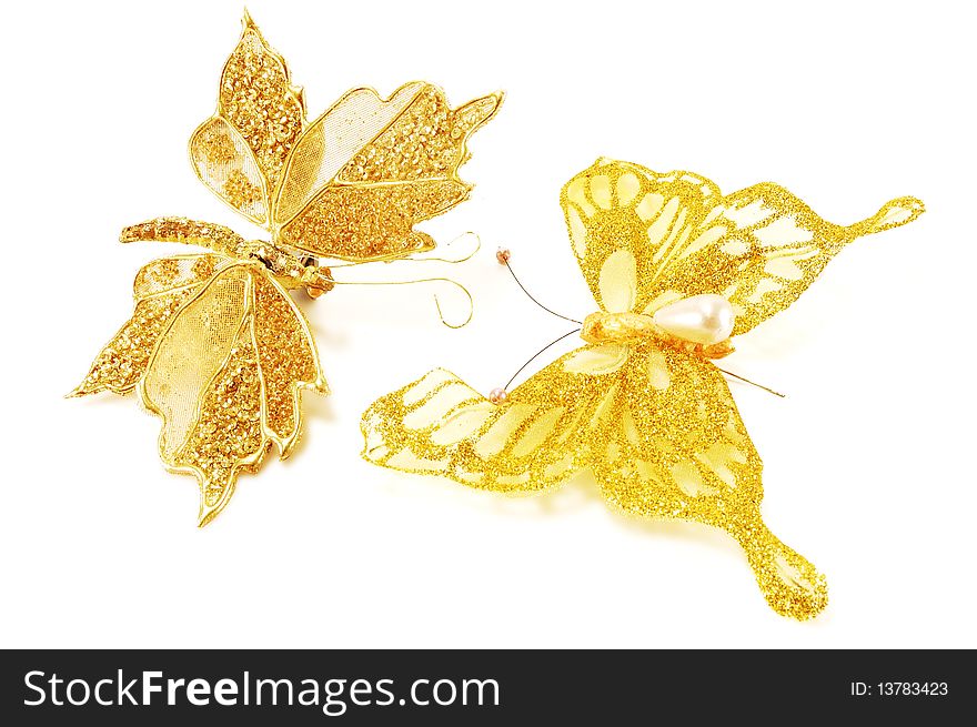 Decorative fabric butterfly with glitter isolated on a white background. Decorative fabric butterfly with glitter isolated on a white background