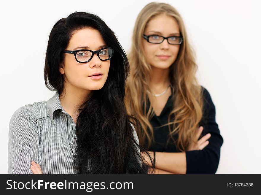 Two young womans, isolated on white background