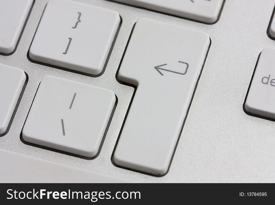 Modern white and silver keyboard close up. Modern white and silver keyboard close up