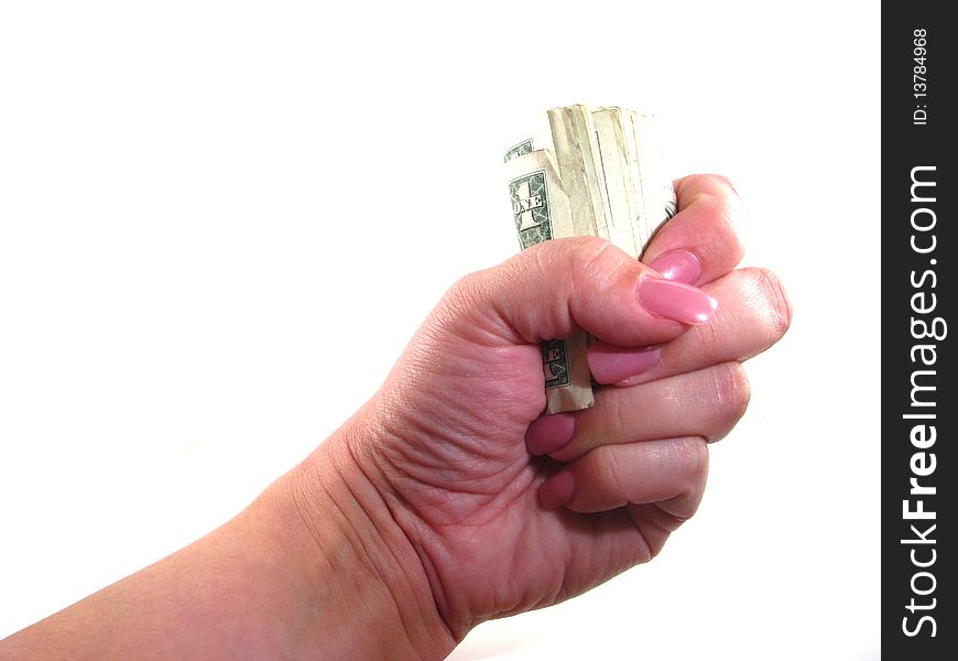 A woman's hand grasping a roll of money. A woman's hand grasping a roll of money