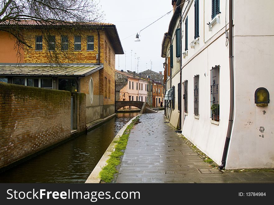 Houses on the river on a rainy day