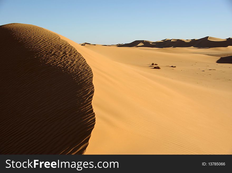 Sand dune in the desert of Libya, in Africa. Sand dune in the desert of Libya, in Africa