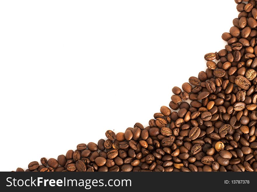Heap of coffee beans isolated on white background
