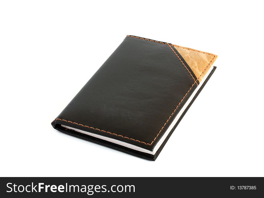 Closed business leather book isolated over white background