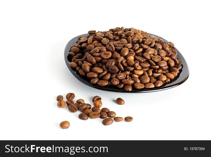 Heap of coffee beans isolated on white background