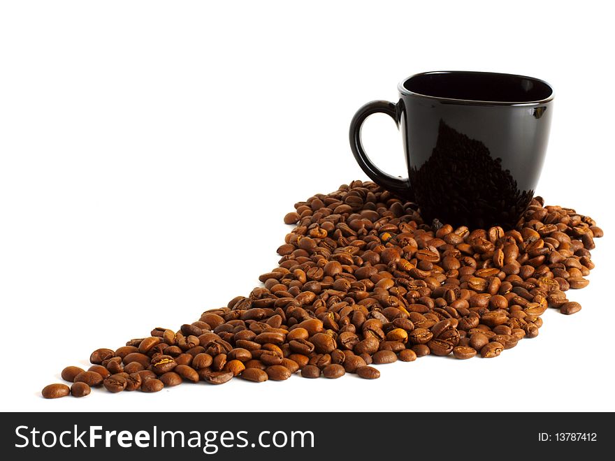 Black cup and coffee beans isolated on white background