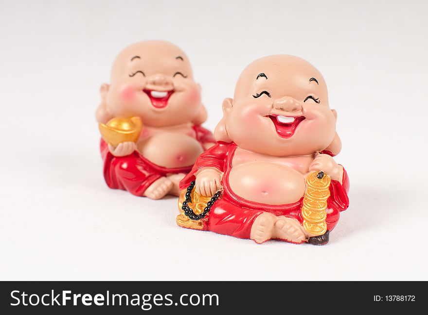A pair of Laughing Buddha Figurine