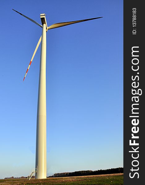 Wind turbine on the clear sky