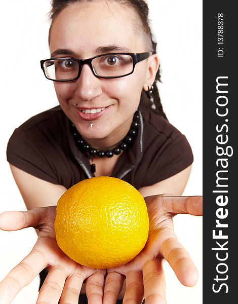 Girl present an orange