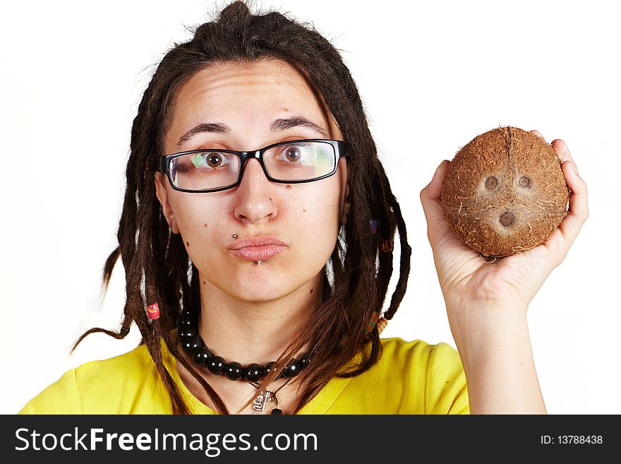 Girl with dreadlocks carring big cocount in hand. Girl with dreadlocks carring big cocount in hand